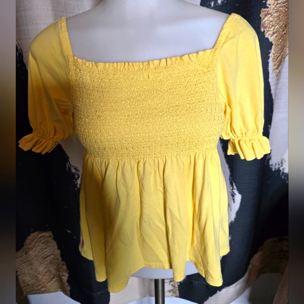 Yellow short sleeved top